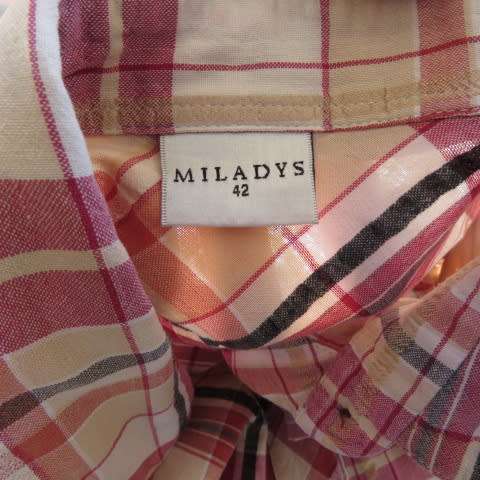 Ladies shirt in red,cream and black check.Size 42/18 by MILADY'S. In bubble cotton. As new.