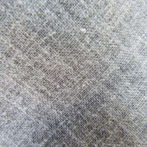 Stylish cover-up coat in olive green and white mottled patterned linen/polyester fabric.Size 36/12