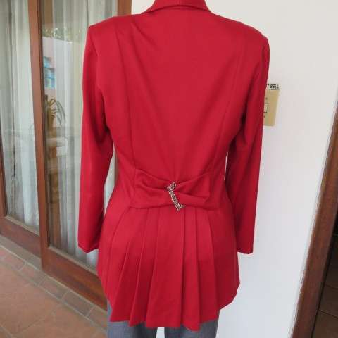 Show stopping red peacoat style long sleeve jacket closing with 2 buttons. Pleats at back.Size 34/10