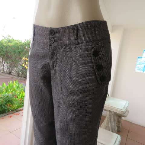 Sexy chic low rise pants in grey/black mottled polyester fabric.Size 36/12 by MASSUMI.Bootlegged.