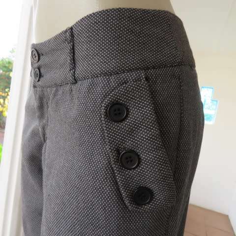 Sexy chic low rise pants in grey/black mottled polyester fabric.Size 36/12 by MASSUMI.Bootlegged.
