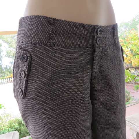 Sexy chic low rise pants in grey/black mottled polyester fabric.Size 36/12 by MASSUMI.Bootlegged.