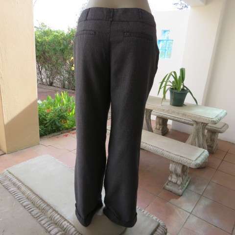 Sexy chic low rise pants in grey/black mottled polyester fabric.Size 36/12 by MASSUMI.Bootlegged.