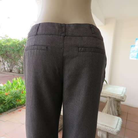 Sexy chic low rise pants in grey/black mottled polyester fabric.Size 36/12 by MASSUMI.Bootlegged.