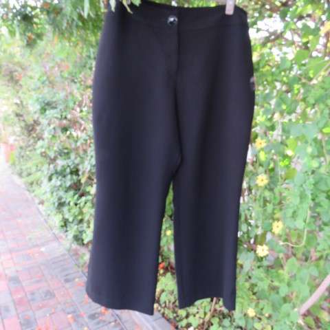 As new black straight legged pants in 100% polyester by DONNA-CLAIRE in size 46/22