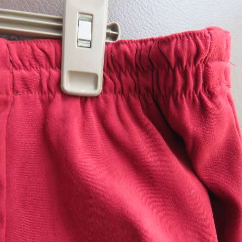 Fabulous maroon stretch polyester pants in size 46/22 by DONNA-CLAIRE.Back waist with elastic sides