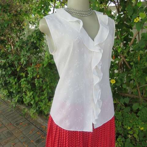 Dainty white sleeveless frilled top in sheer embroidered polyester. Size 36 By WOOLWORTHS.As new.