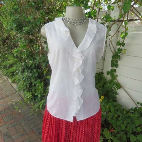 Dainty white sleeveless frilled top in sheer embroidered polyester. Size 36 By WOOLWORTHS.As new.