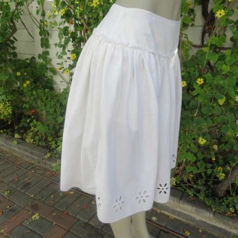 White fine cotton skirt with yoke and gathered bottom with lining, Embroidered border.Size 36/12
