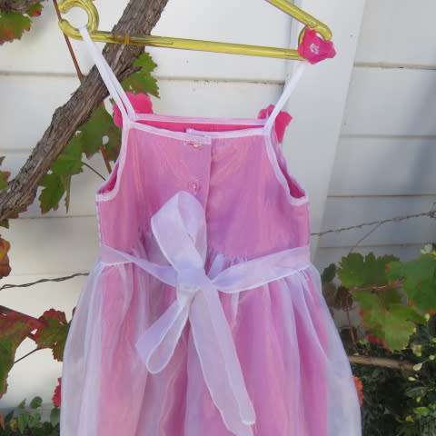 Cute special occasion strappy dress with pink underlay and sheer top layer .For 5 to 6 year old.