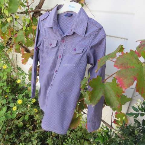 Handsome blue striped long sleeve shirt for boy of 11 yrs old in cotton. Two front pockets. As new.