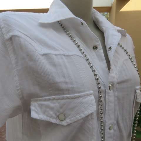 Casual white short sleeve top closing with press buttons. Size 36/12 by RT. Cowboy yokes.As new
