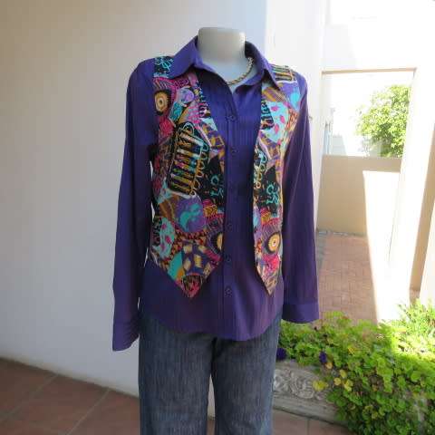 Funky waistcoat in medley of colours and patterns and black back. Size 34/10. New condition.