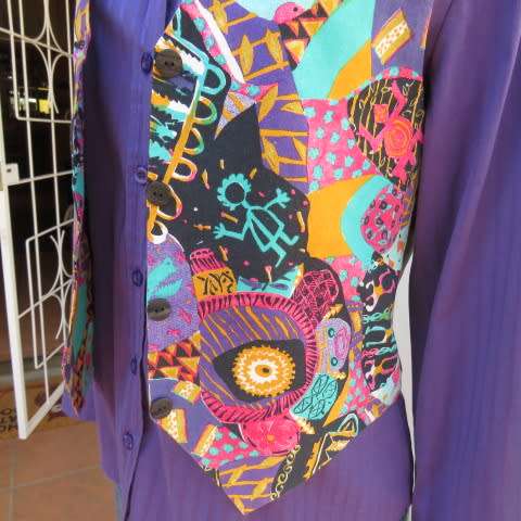 Funky waistcoat in medley of colours and patterns and black back. Size 34/10. New condition.
