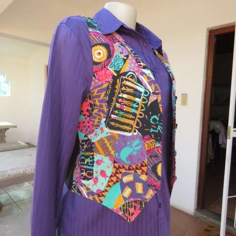 Funky waistcoat in medley of colours and patterns and black back. Size 34/10. New condition.