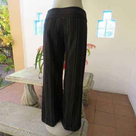 Elegant black pants with thin white vertical stripes by OASIS in size 36/12. Large size. As new