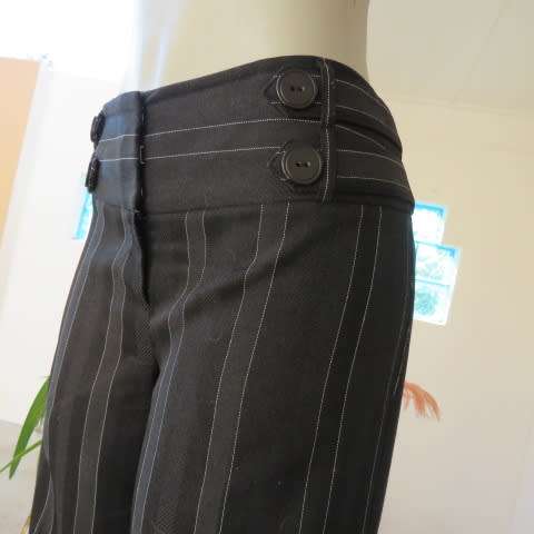 Elegant black pants with thin white vertical stripes by OASIS in size 36/12. Large size. As new