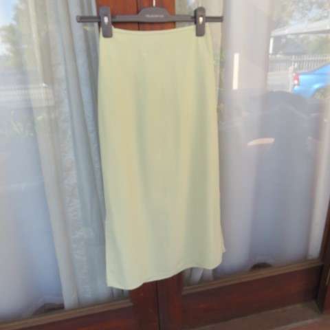 Soft mint green straight maxi skirt for girl of 12 to 13 years old by GIRLS UNLIMITED. As new
