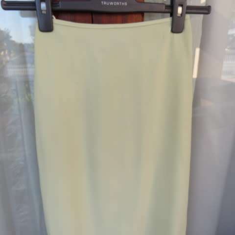 Soft mint green straight maxi skirt for girl of 12 to 13 years old by GIRLS UNLIMITED. As new