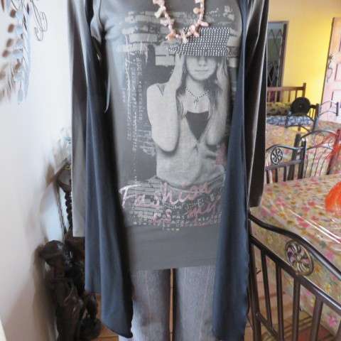 Grey cotton stretch long sleeve slip over top with logo and front black waterfall attachment.32