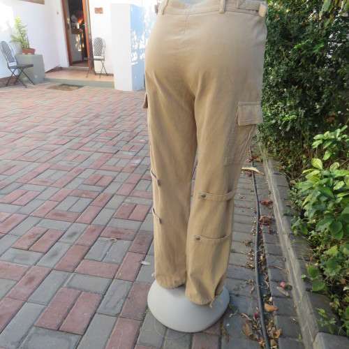 Sassy dark beige corduroy pants in size 38/14 by CASUAL AMERICAN.Side pockets.