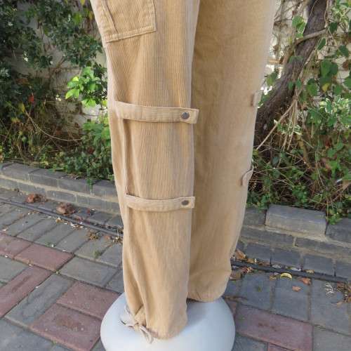 Sassy dark beige corduroy pants in size 38/14 by CASUAL AMERICAN.Side pockets.