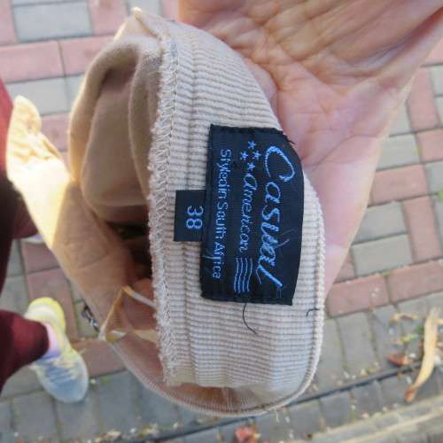 Sassy dark beige corduroy pants in size 38/14 by CASUAL AMERICAN.Side pockets.