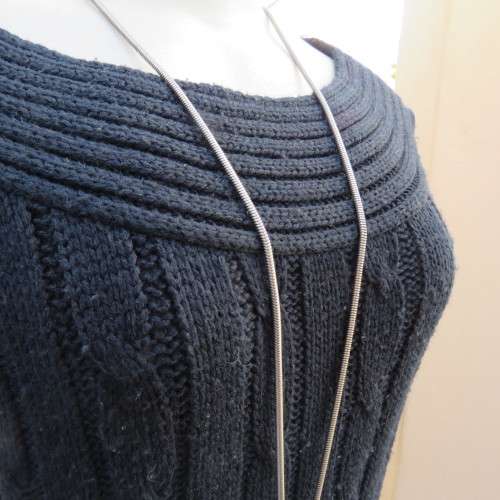 Up style black cable knit long top/short dress in size 34/10 by SEDUCTION. Capped sleeves.
