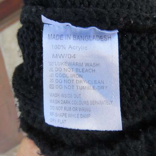Up style black cable knit long top/short dress in size 34/10 by SEDUCTION. Capped sleeves.