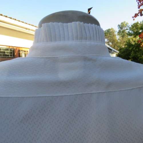 Feminine white vintage blouse from the 80's. By FOSHINI size 36/12.High pleated neckline.As new