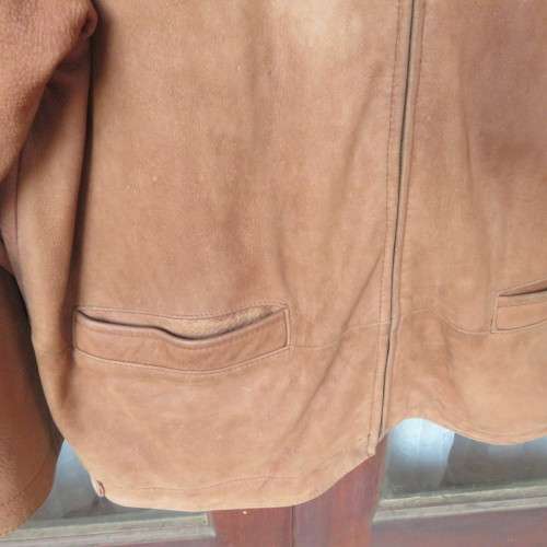 Handsome men's tan colour zip up genuine leather jacket with chest 120cm....Medium. Very good cond.