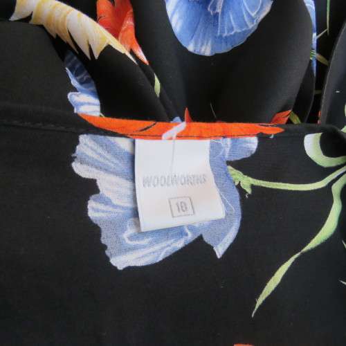 Cheerful 90's black viscose empire style dress with blue,orange and yellow flowers. size 42/18.