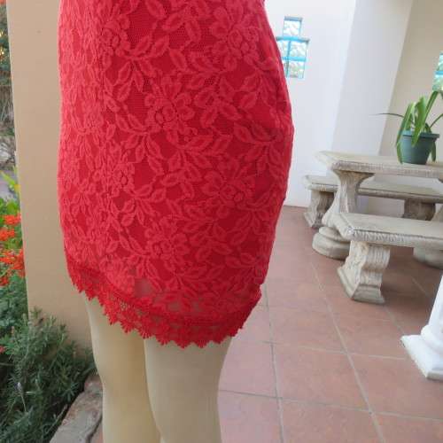 Little red lace dress with lining in size 34/10.Scoloped V neckline.Tiny sleeves. Mini length.As new