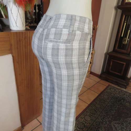 Sassy silvergrey check pants with silver thread by TALLY WEIJL in size 32/8. Imported. As new