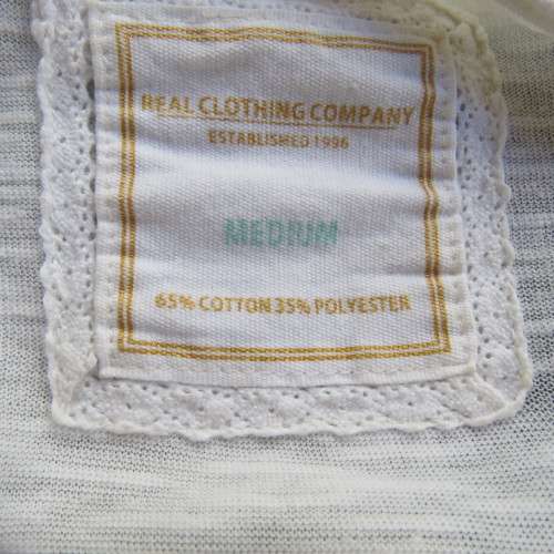 Easy to wear cream slip over elbow length top in stretch polycotton. Size 38/14 by `Real` clothing.
