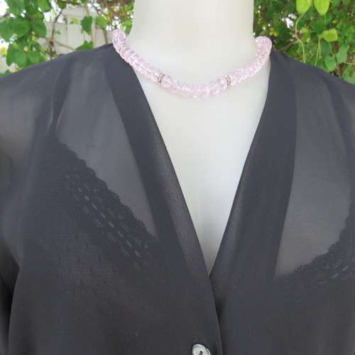 Waterfall style sheer black long sleeve top with V front size 38/14. In 100% polyester fabric.