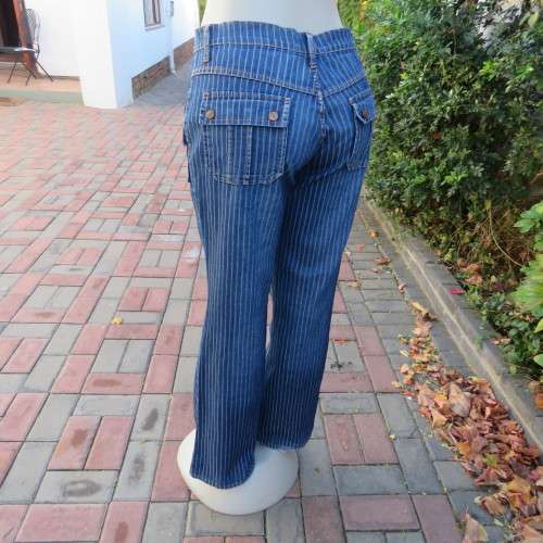 Boyfriend style vertical striped blue denim jeans. Boot legged. Size 40/16 by 'Estee Egee'.