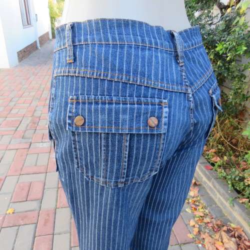 Boyfriend style vertical striped blue denim jeans. Boot legged. Size 40/16 by 'Estee Egee'.