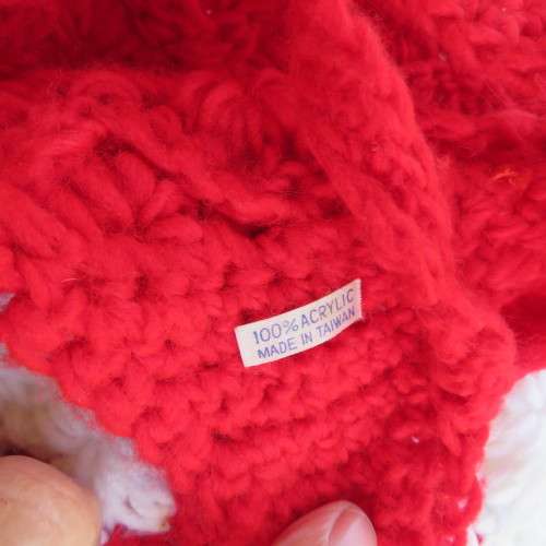 Warm earflap hat with ties for those cold days. New condition with pom pom.