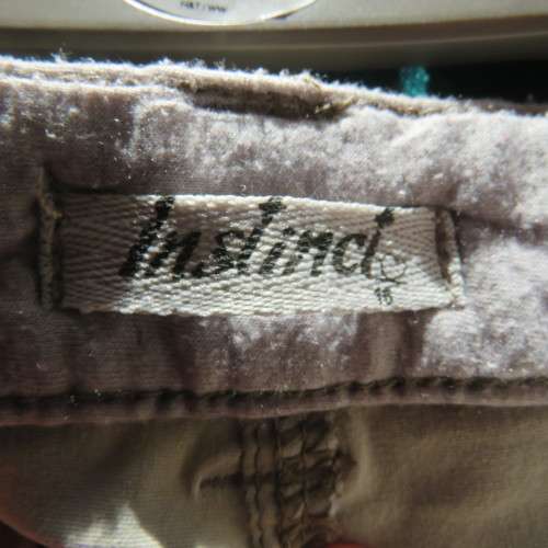 Tomboy look pants by 'Instinct' size 40/16. In beige and brown check stretch cotton. New condition.