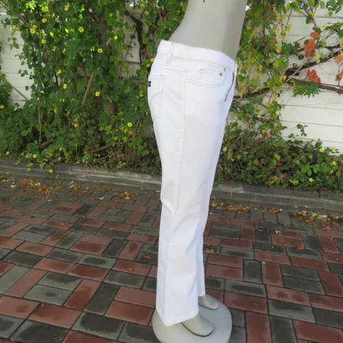 Best quality white SISSY BOY denim jeans in size 38/14 Boot cut.Pockets back and front. New cond.