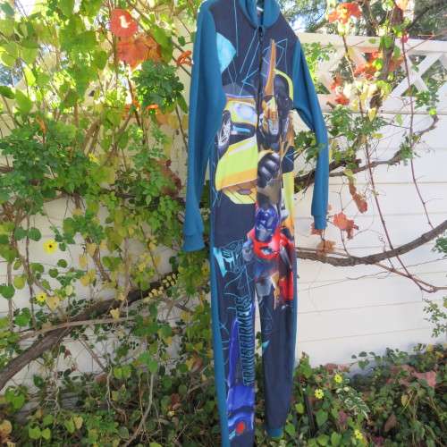 Onesie in blue with Transformers print on front. Zip on front. Hooded. For 12 to 13 year old boy.