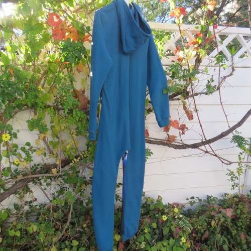 Onesie in blue with Transformers print on front. Zip on front. Hooded. For 12 to 13 year old boy.
