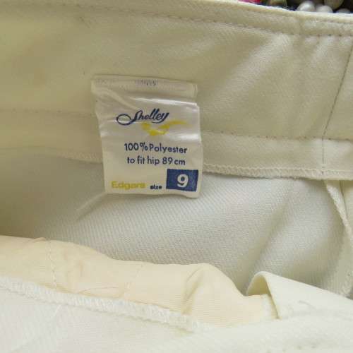 Cream vintage polyester pants by SHELLEY in size 31/7. Pockets on front. New condition