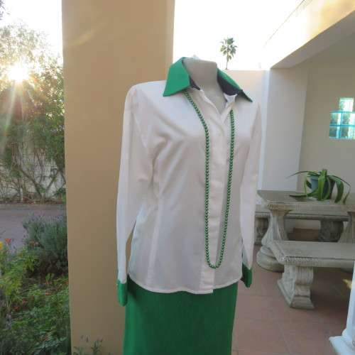 As new long sleeve soft 100% cotton shirt with green and black shirt collar and cuffs. Size 38/14