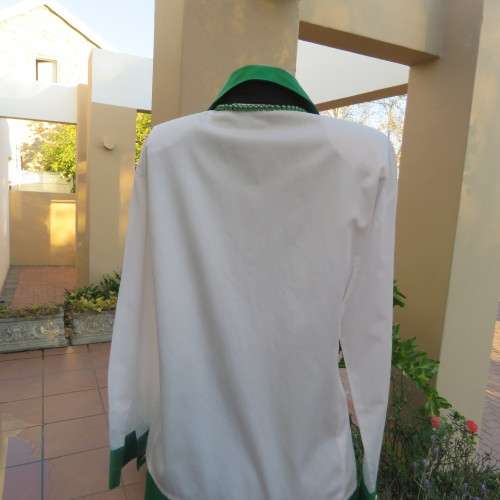 As new long sleeve soft 100% cotton shirt with green and black shirt collar and cuffs. Size 38/14