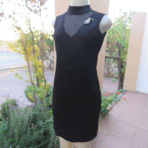 The little black dress! Size 34/10 by IQ Smart clothes.Stretch textured polyester.New condition.