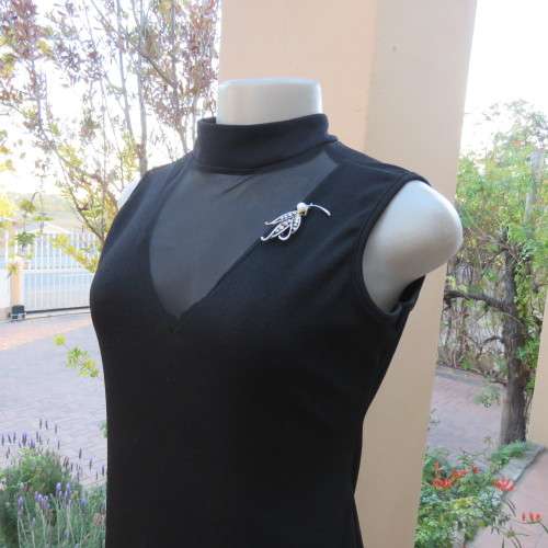 The little black dress! Size 34/10 by IQ Smart clothes.Stretch textured polyester.New condition.