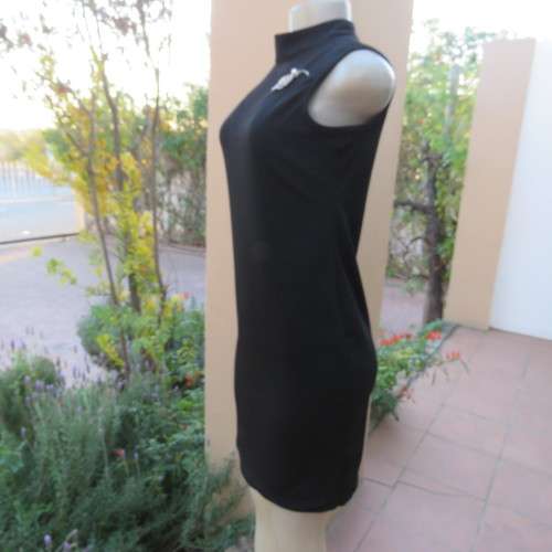 The little black dress! Size 34/10 by IQ Smart clothes.Stretch textured polyester.New condition.