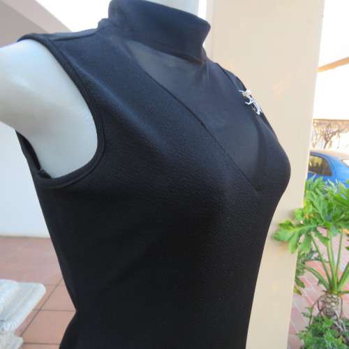 The little black dress! Size 34/10 by IQ Smart clothes.Stretch textured polyester.New condition.